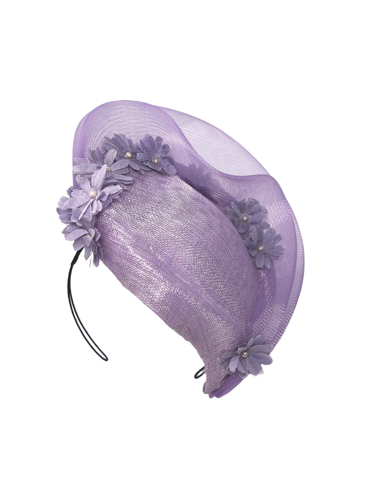 Lavender mesh headband with floral accents on a white background