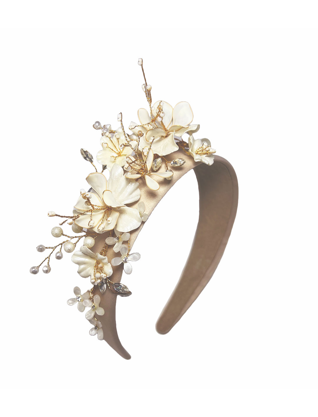 Decorative headband with floral elements on a white background
