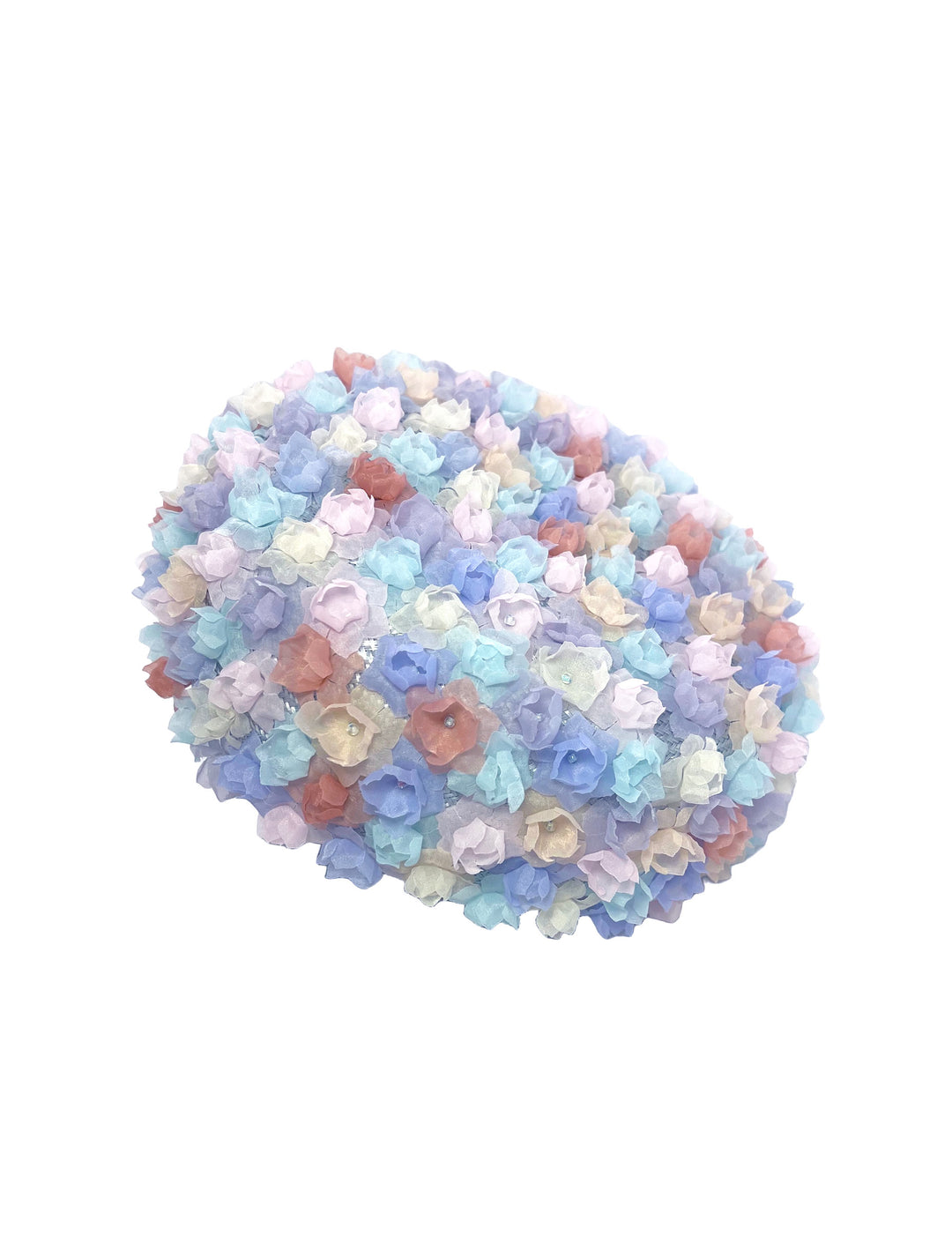 Colorful flower-shaped beads on a white background