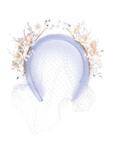 crown looking grey blue silk headband decorated with wired pearl colour flowers and light lilac veil