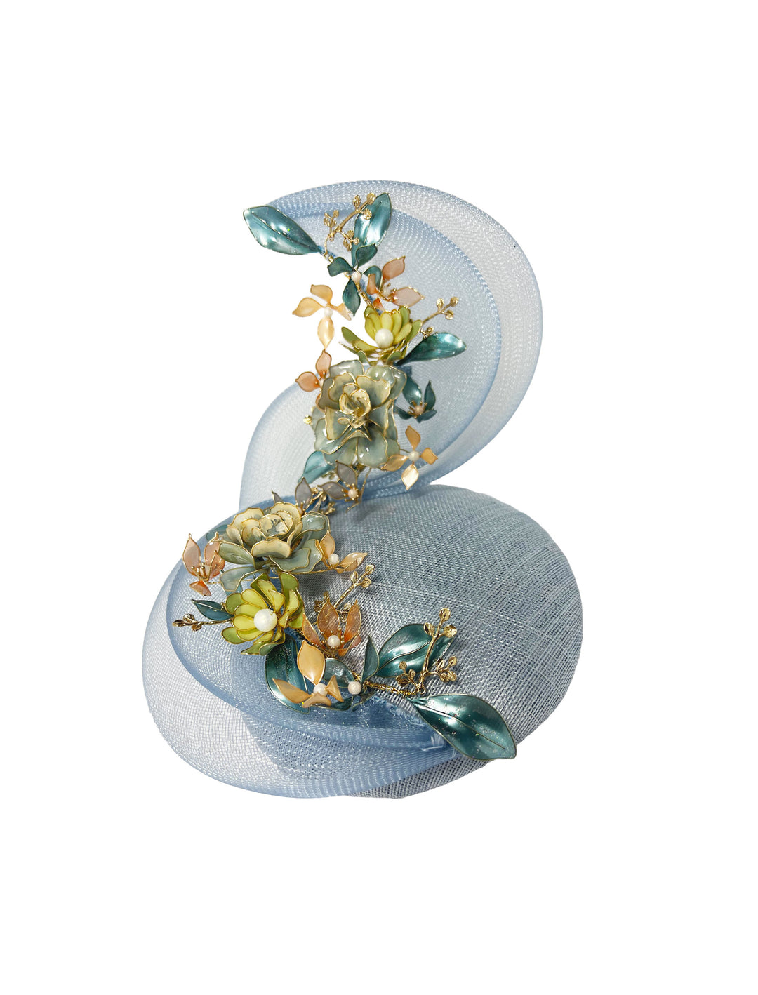 Light blue fascinator with floral decorations on a white background