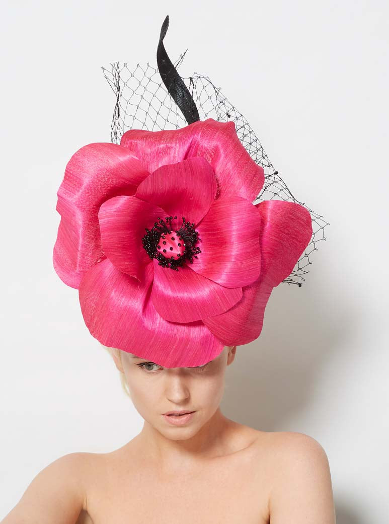 A large flower fascinator perfect for Royal Ascot and other high fashion events