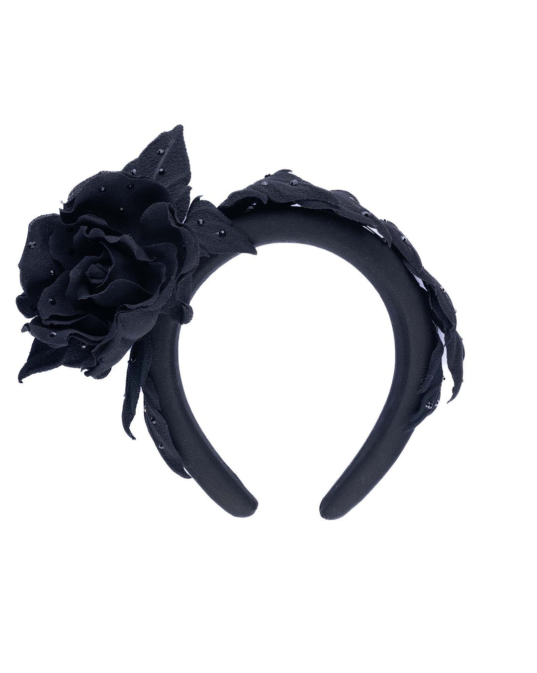 Still life picture of high lycra black headband, decorated with crepe rose and leafs embellished with crystals made by Merve Bayindir millinery.