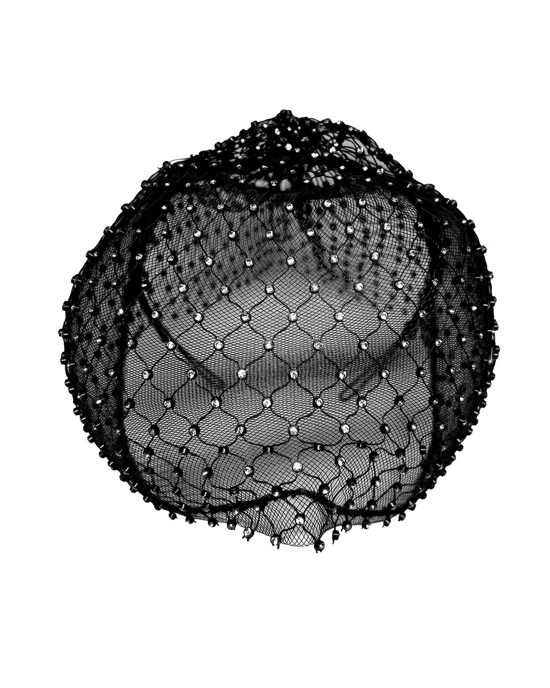 Black birdcage veil mask crafted from fine netting, embellished with a grid of small silver crystal accents and trimmed with delicate beaded edging for a dramatic, couture-inspired finish. Designed and made by Merve Bayindir Millinery.



