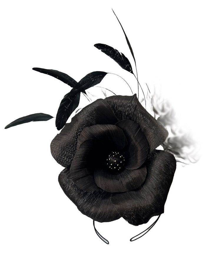 Product picture a large black silk abaca flower fascinator by Merve Bayindir.