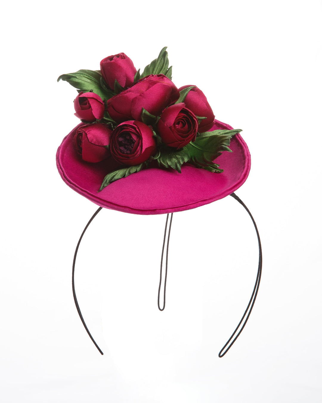 Small saucer style pink sateen fascinator, embellished sateen wild rose bouquet.